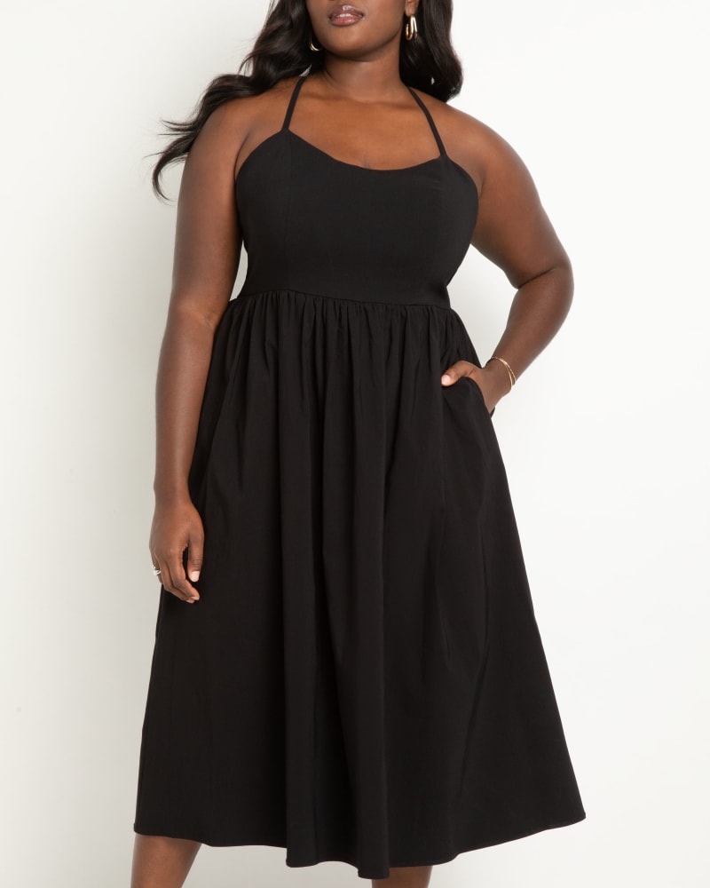 Front of a model wearing a size 18 Full Skirted Midi Dress in Black Onyx by ELOQUII. | dia_product_style_image_id:303795